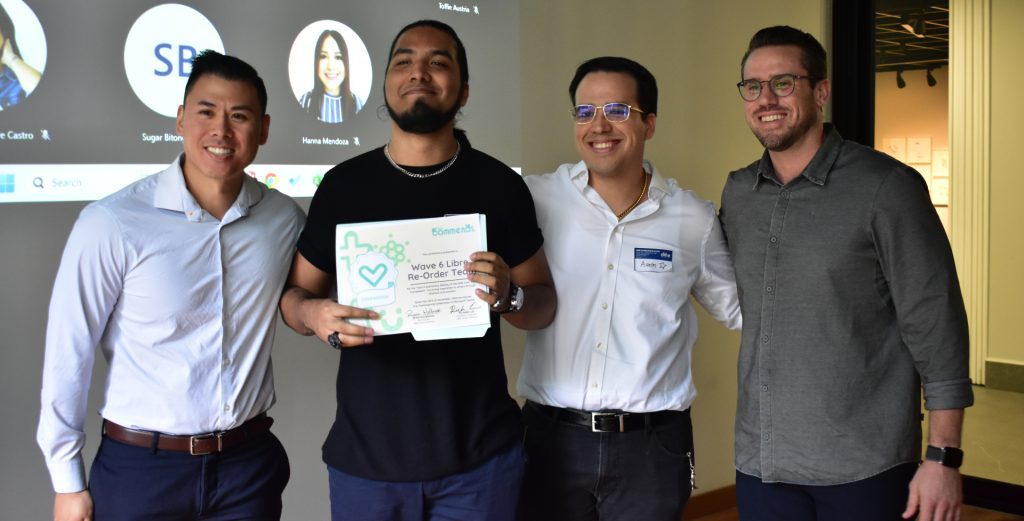 Ryan Holbrook and Richard Lee poses with the leadership summit participants.